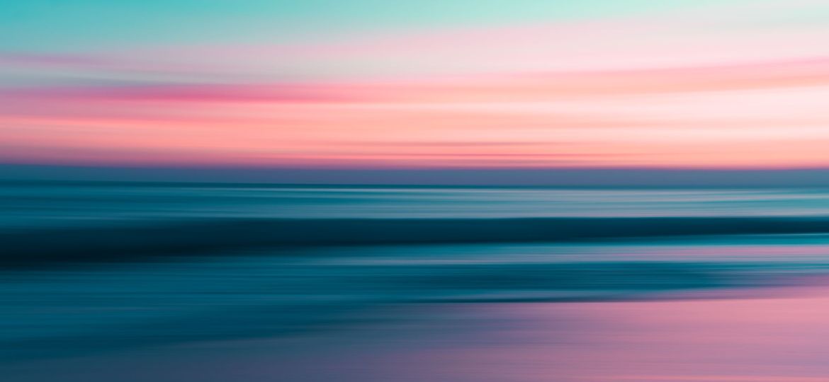 Sunrise over the ocean, abstract colorful scene in bright blue a
